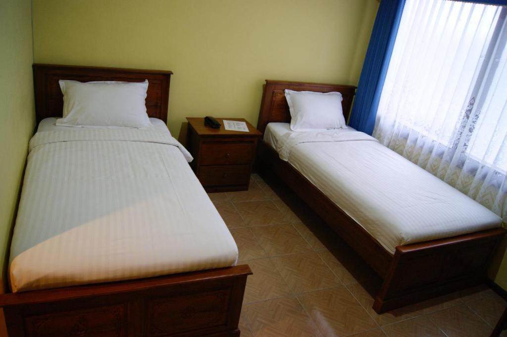 Grand Sumatera Hotel Surabaya Szoba fotó